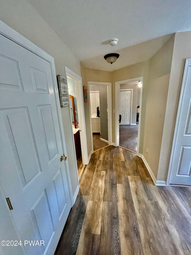 hall featuring dark hardwood / wood-style flooring