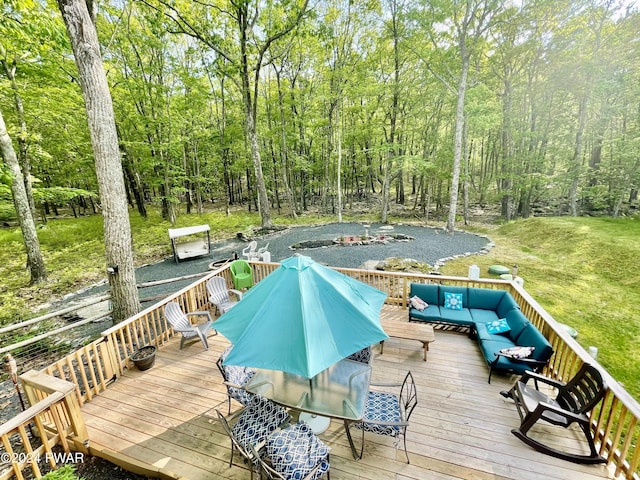 view of swimming pool featuring a yard, an outdoor hangout area, and a deck