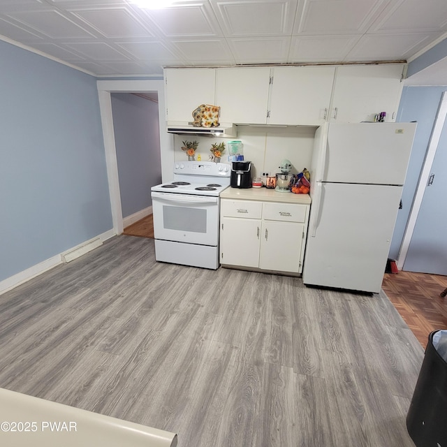 kitchen featuring white cabinetry, light wood-type flooring, and white appliances