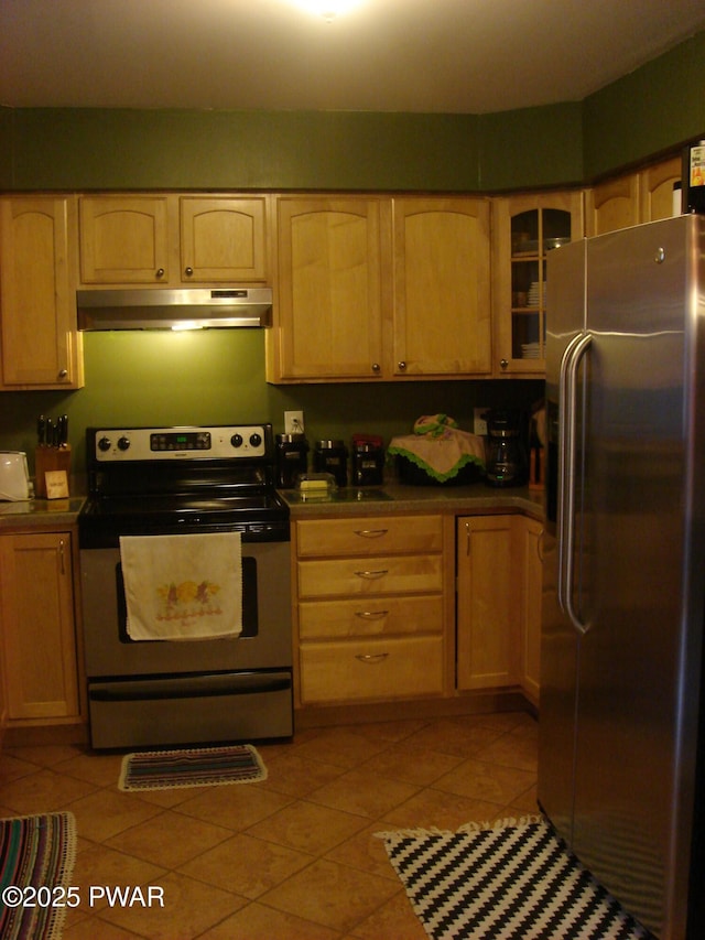 113 Oak Dr, Shohola, PA 18458 - kitchen with appliances with stainless steel finishes, under cabinet range hood, light tile patterned floors, and light brown cabinetry