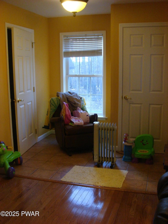 113 Oak Dr, Shohola, PA 18458 - living room with radiator and wood finished floors