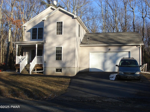 113 Oak Dr, Shohola, PA 18458 - traditional-style home featuring driveway and an attached garage