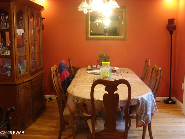 113 Oak Dr, Shohola, PA 18458 - dining space with light wood-style floors and baseboards