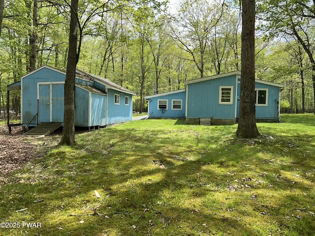 201 Oak Hill Rd, Hawley, PA 18428 - view of green lawn featuring an outdoor structure and a storage shed