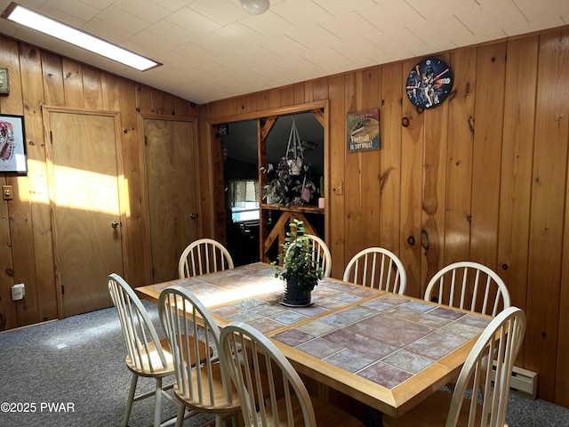 201 Oak Hill Rd, Hawley, PA 18428 - dining area featuring carpet and wood walls