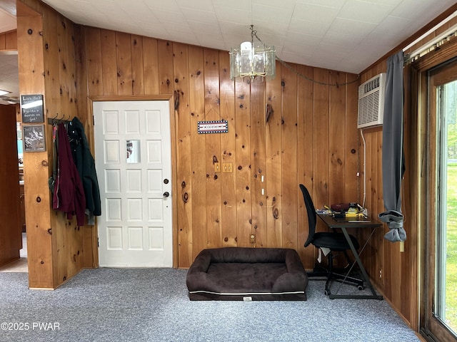 201 Oak Hill Rd, Hawley, PA 18428 - foyer featuring carpet flooring, wood walls, plenty of natural light, and a wall mounted AC