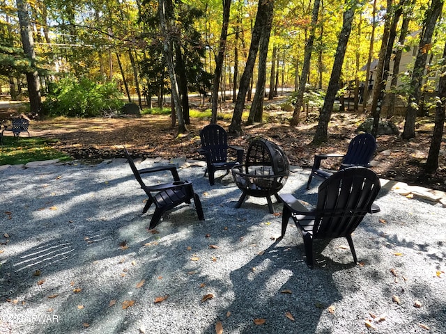 view of patio / terrace with a fire pit