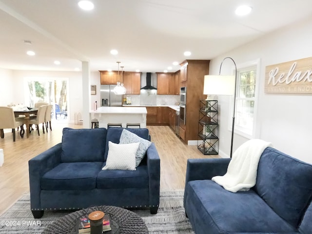 living room with light hardwood / wood-style floors