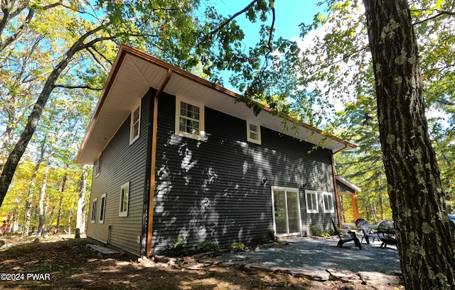 view of home's exterior featuring a patio area