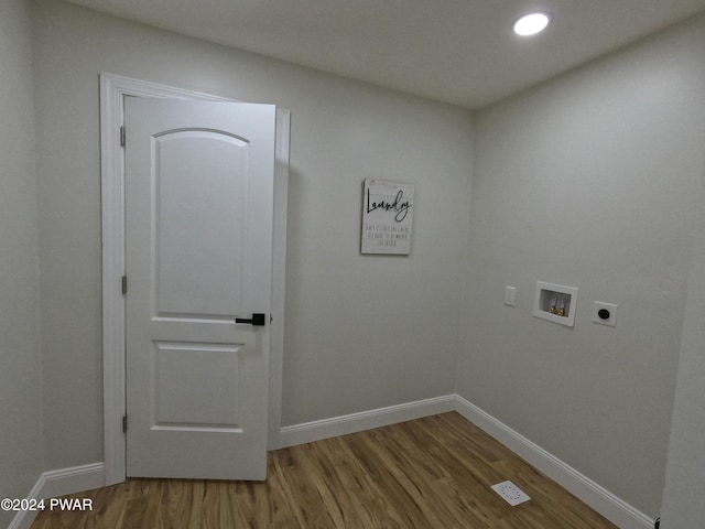 laundry room featuring hookup for an electric dryer, washer hookup, and hardwood / wood-style floors