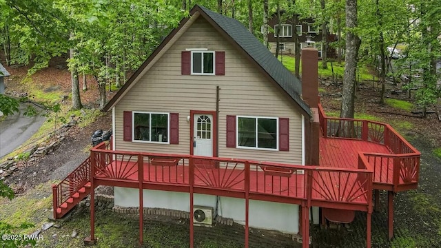 122 Westfall Dr, Dingmans Ferry, PA 18328 - rear view of house with a wooden deck, a chimney, stairway, and a cooling unit