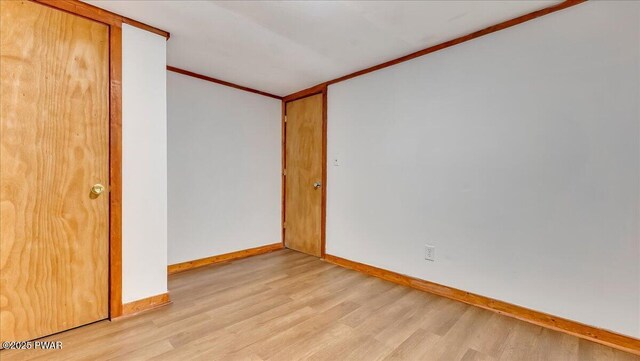 122 Westfall Dr, Dingmans Ferry, PA 18328 - unfurnished room with light wood-style floors, baseboards, and ornamental molding