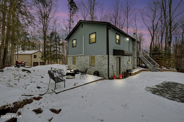 view of snow covered property