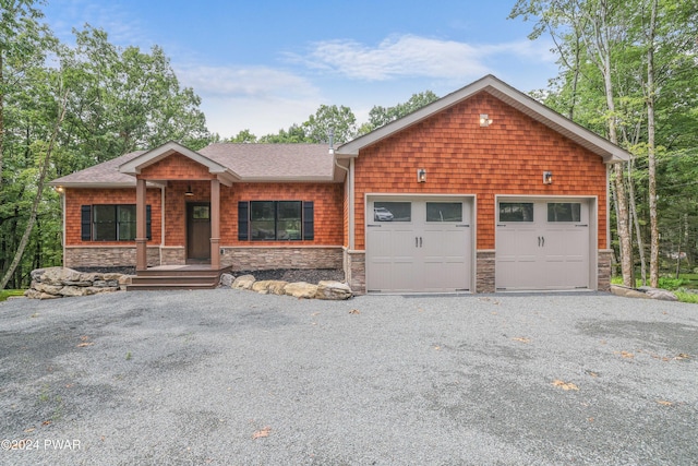 view of front of property with a garage