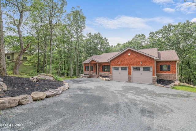 view of front of property with a garage