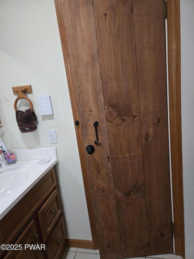 100 Saddlebrook Ln, Lords Valley, PA 18428 - bathroom with vanity, baseboards, and tile patterned flooring
