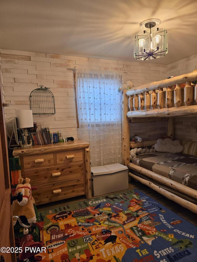 100 Saddlebrook Ln, Lords Valley, PA 18428 - bedroom featuring a chandelier