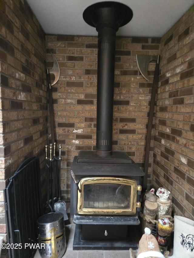 100 Saddlebrook Ln, Lords Valley, PA 18428 - detailed view of a wood stove and brick wall