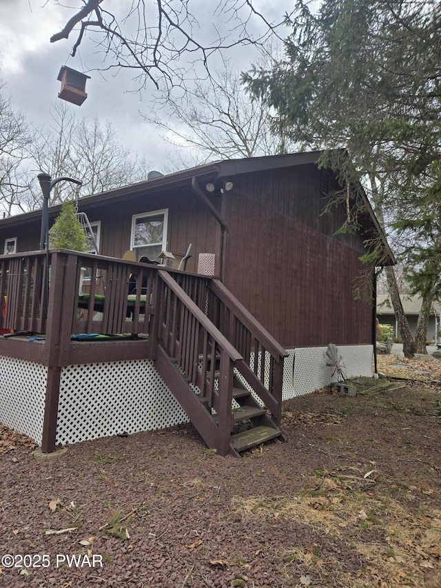 100 Saddlebrook Ln, Lords Valley, PA 18428 - back of property featuring a wooden deck