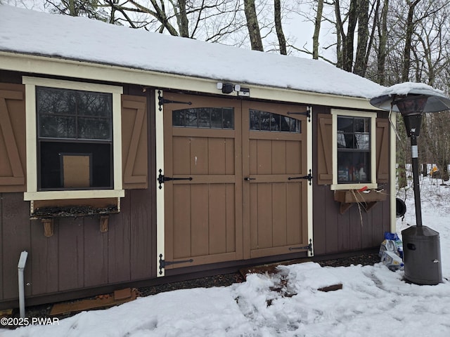 100 Saddlebrook Ln, Lords Valley, PA 18428 - snow covered structure featuring a storage unit and an outdoor structure