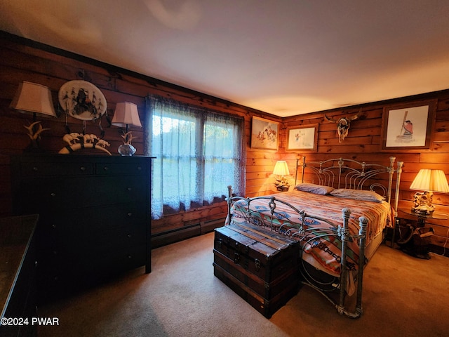 bedroom with carpet flooring and wooden walls