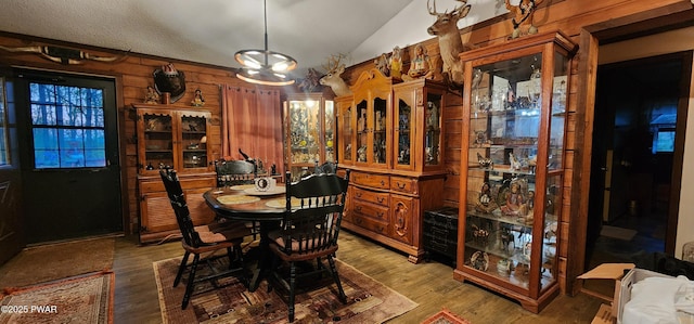 145 Father John Dr, Lake Ariel, PA 18436 - dining room with vaulted ceiling, wood finished floors, and wood walls