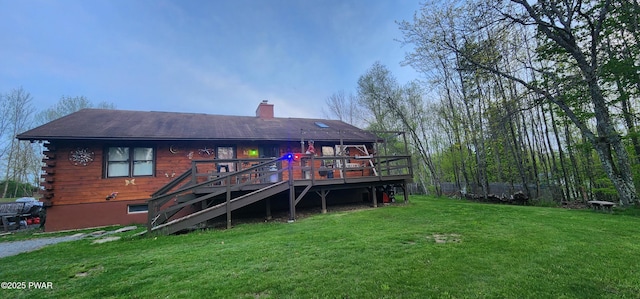 145 Father John Dr, Lake Ariel, PA 18436 - back of property featuring a wooden deck, a chimney, log siding, and stairway