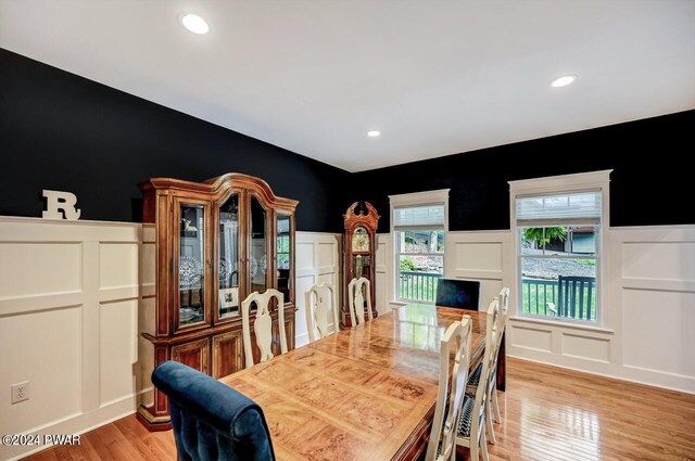 dining space featuring light hardwood / wood-style flooring