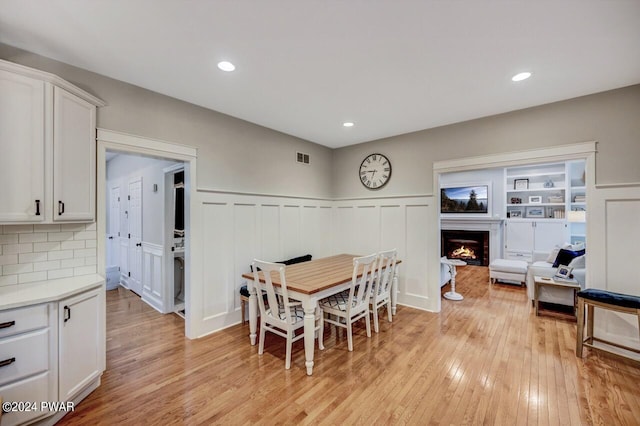 dining room featuring light hardwood / wood-style flooring