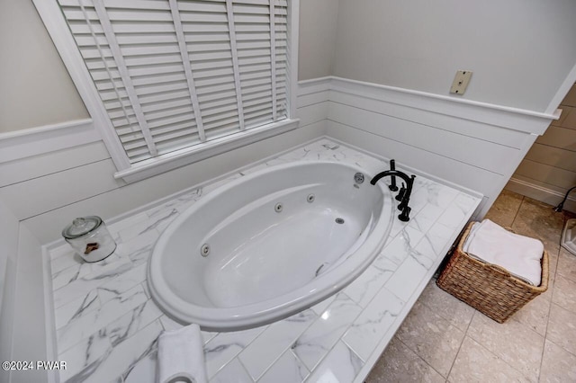 bathroom with a tub