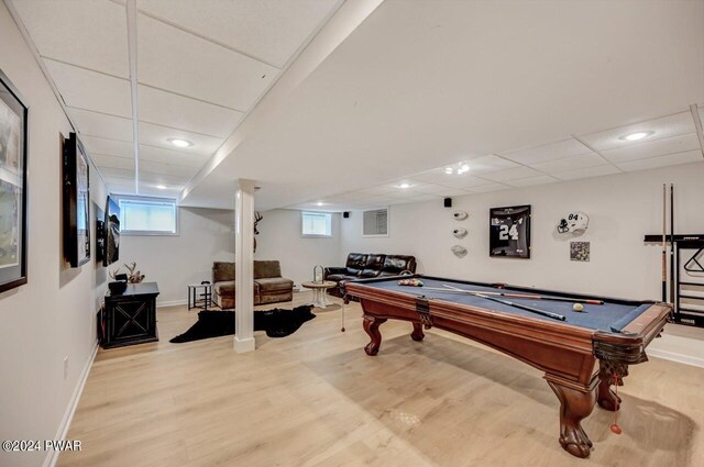 recreation room featuring a drop ceiling, light wood-type flooring, and billiards