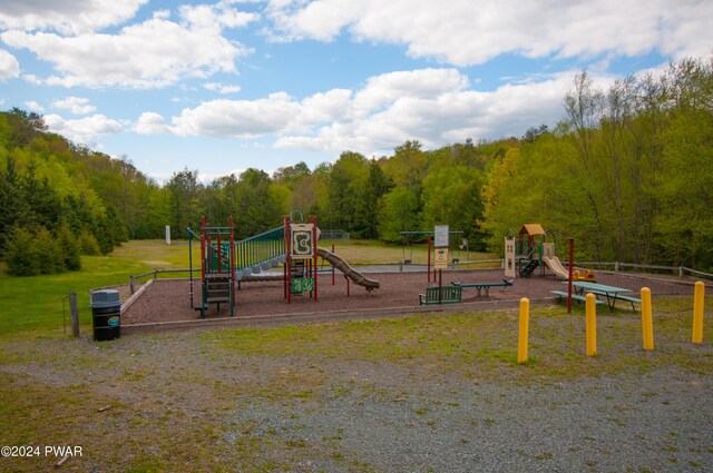 view of jungle gym with a yard