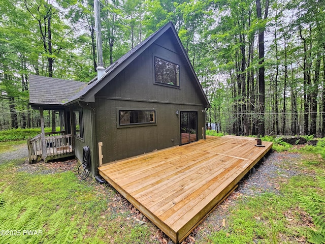 23 Highland Ln, Hawley, PA 18428 - view of property exterior featuring a deck and a shingled roof