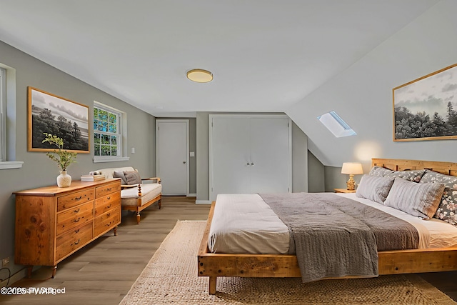 133 Neil Thompson Rd, Lackawaxen, PA 18435 - bedroom featuring light wood-style floors and a skylight