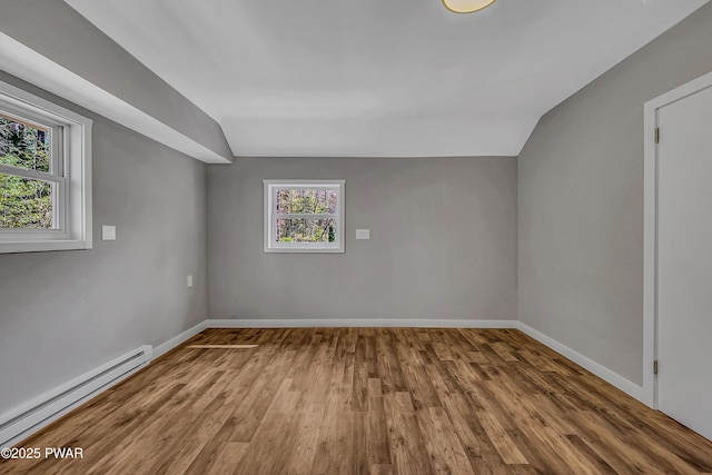 133 Neil Thompson Rd, Lackawaxen, PA 18435 - bonus room featuring a baseboard heating unit, wood finished floors, and lofted ceiling