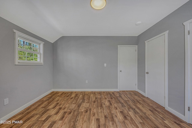 133 Neil Thompson Rd, Lackawaxen, PA 18435 - empty room with wood finished floors and lofted ceiling