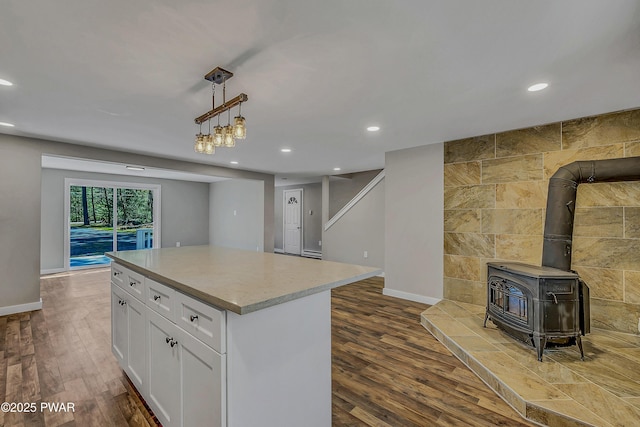 133 Neil Thompson Rd, Lackawaxen, PA 18435 - kitchen with recessed lighting, dark wood finished floors, white cabinetry, hanging light fixtures, and a kitchen island