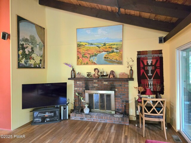 113 Widgeon Ln, Lords Valley, PA 18428 - living area with wood finished floors, wood ceiling, and a brick fireplace