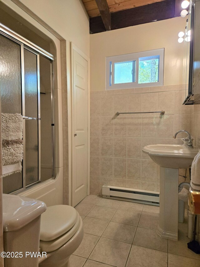 113 Widgeon Ln, Lords Valley, PA 18428 - bathroom with a baseboard radiator, tile walls, tile patterned floors, beamed ceiling, and toilet