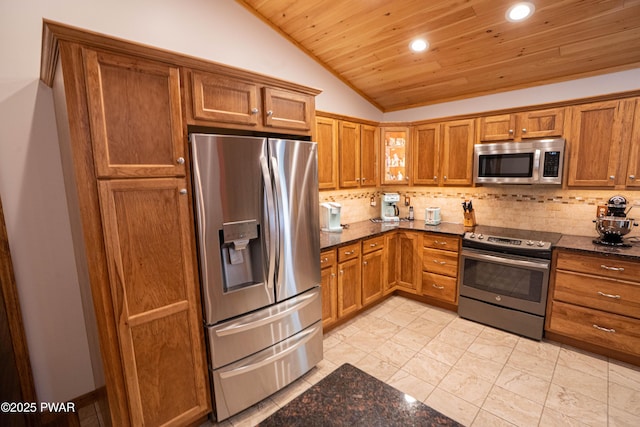 1010 Lotus Ter, Lake Ariel, PA 18436 - kitchen with stainless steel appliances, lofted ceiling, brown cabinetry, wooden ceiling, and recessed lighting