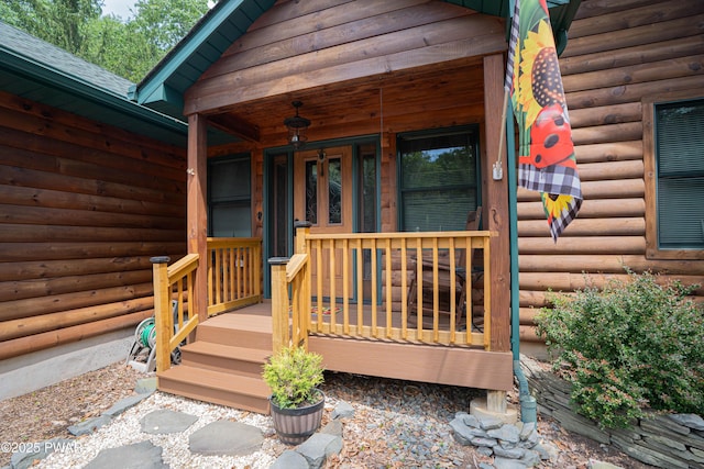 1010 Lotus Ter, Lake Ariel, PA 18436 - property entrance with log veneer siding and covered porch