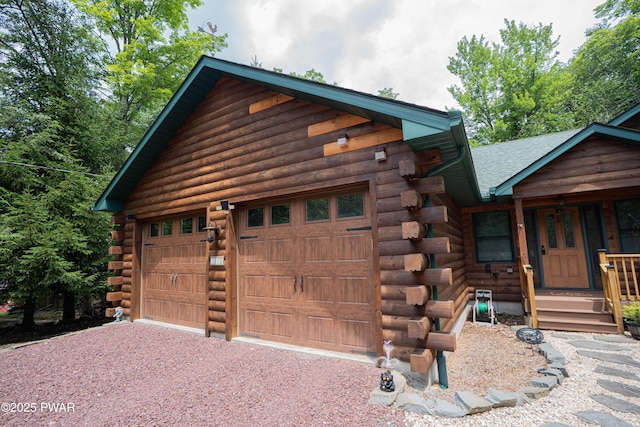 1010 Lotus Ter, Lake Ariel, PA 18436 - view of front of house with log exterior and a shingled roof