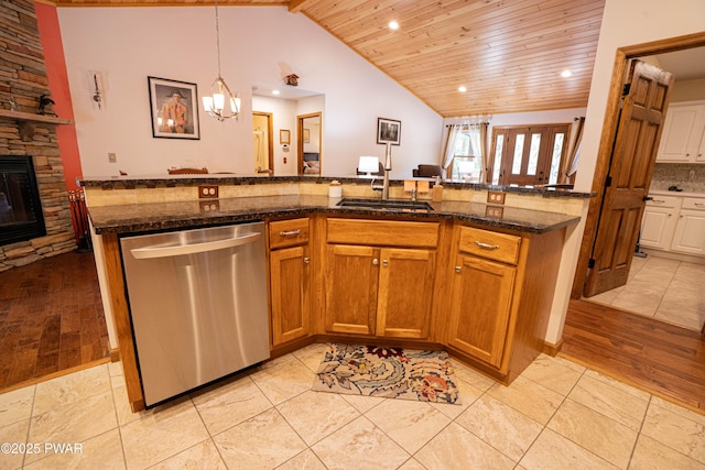 1010 Lotus Ter, Lake Ariel, PA 18436 - kitchen featuring stainless steel dishwasher, wooden ceiling, lofted ceiling, recessed lighting, and brown cabinetry
