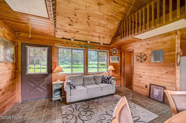 living room featuring electric panel, wood walls, high vaulted ceiling, and wooden ceiling