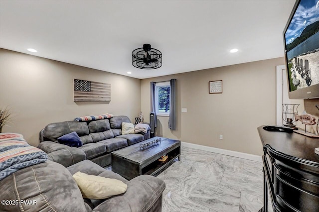 living room featuring recessed lighting, baseboards, and marble finish floor