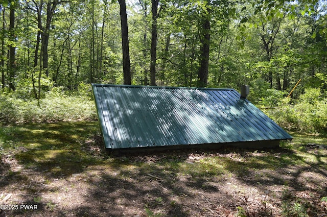 292 Well Rd, Greeley, PA 18425 - view of outdoor structure featuring a wooded view