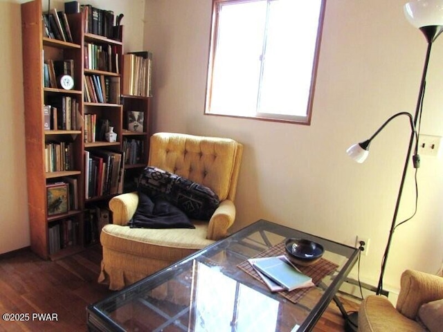 living area with wood finished floors