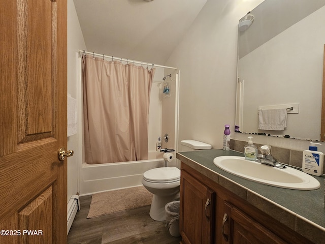 115 Deer Path, Tafton, PA 18464 - bathroom with a baseboard heating unit, vanity, shower / bath combo, wood finished floors, and vaulted ceiling
