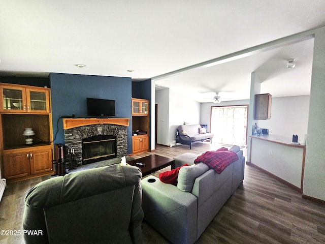 115 Deer Path, Tafton, PA 18464 - living room with wood finished floors, a stone fireplace, and ceiling fan