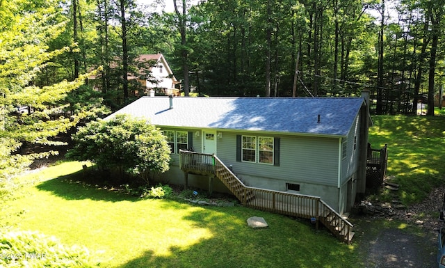 115 Deer Path, Tafton, PA 18464 - view of front facade with a front lawn, a shingled roof, and stairs